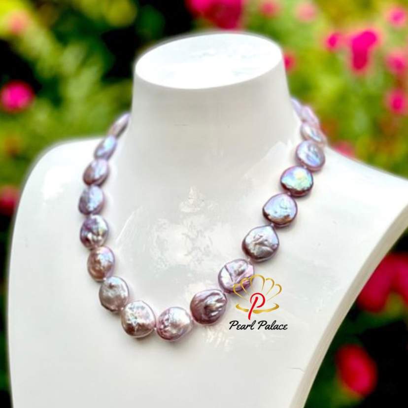 A magnificent, and very rare tone of large Freshwater Baroque Coin pearls — 2
